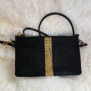 The Sak Snakeskin Black and Gold Women's Crossbody/Clutch